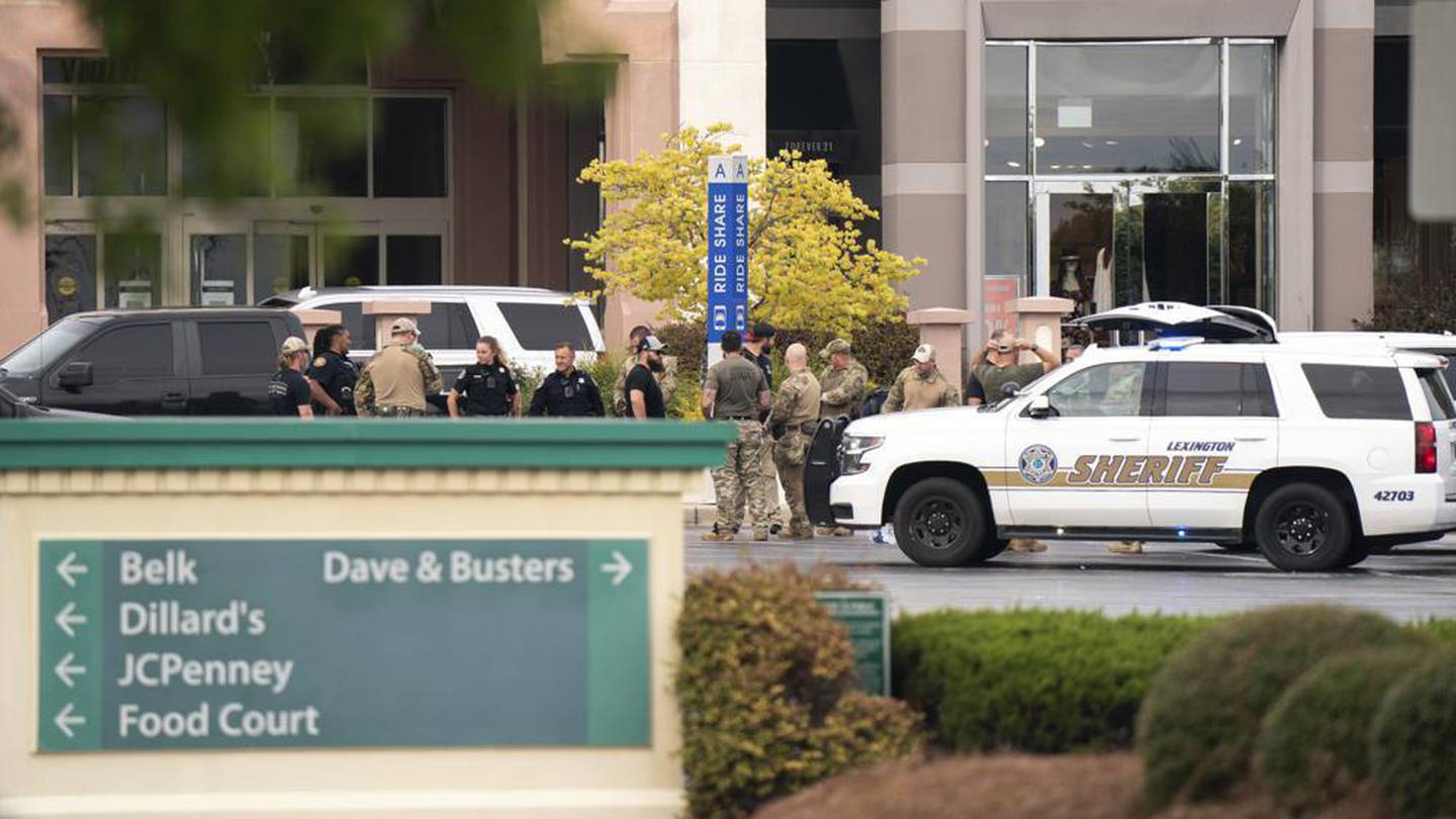 Members of law enforcement gather outside Columbiana Centre mall in Columbia, S.C., following a shooting. Photo / AP
