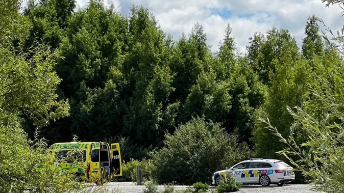 St John Ambulance and police at the scene on part of the walking trail. Photo / James Allan