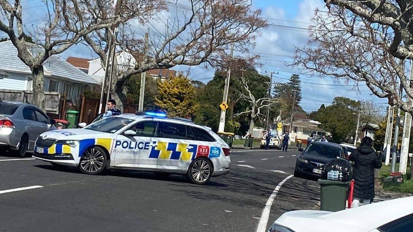 Police cars could be seen at Manurewa shopping centre where robbers targeted F Bar venue today. Photo / William N Walas