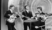 The Beatles perform Rain and Paperback Writer on BBC TV show Top Of The Pops in London on June 15, 1966. (From left): John Lennon (1940-1980), Sir Paul McCartney, Sir Ringo Starr and George Harrison (1943-2001). Photo / Getty Images