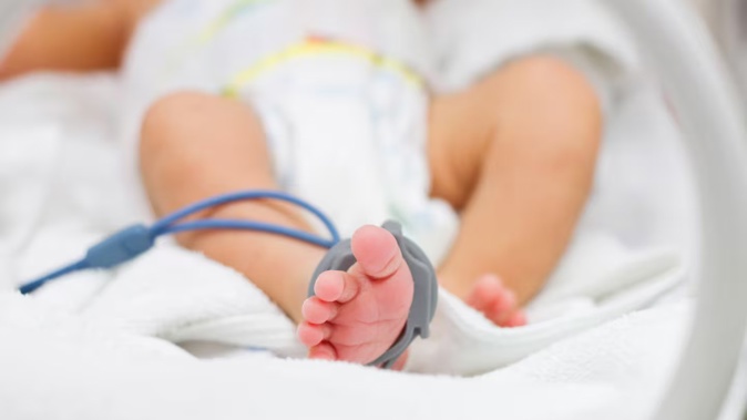 The baby was flown to Starship Hospital with injuries from blunt force trauma. Photo / 123rf