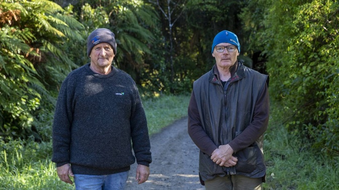 Off-road motorcyclists Jim Moore, left, and Andy McCullum at the entrance to Akatarawa Forest Park after their overnight ordeal. Photo / Mark Mitchell
