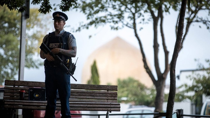 Armed police guard the Masjid Al Noor, Deans Ave Mosque on March 17, 2019. Photo / Michael Craig.