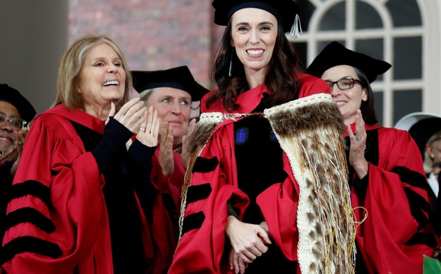 Honorary degree recipient Gloria Steinem, left, applauds fellow honorary degree recipient Jacinda Ardern at Harvard. Photo / AP