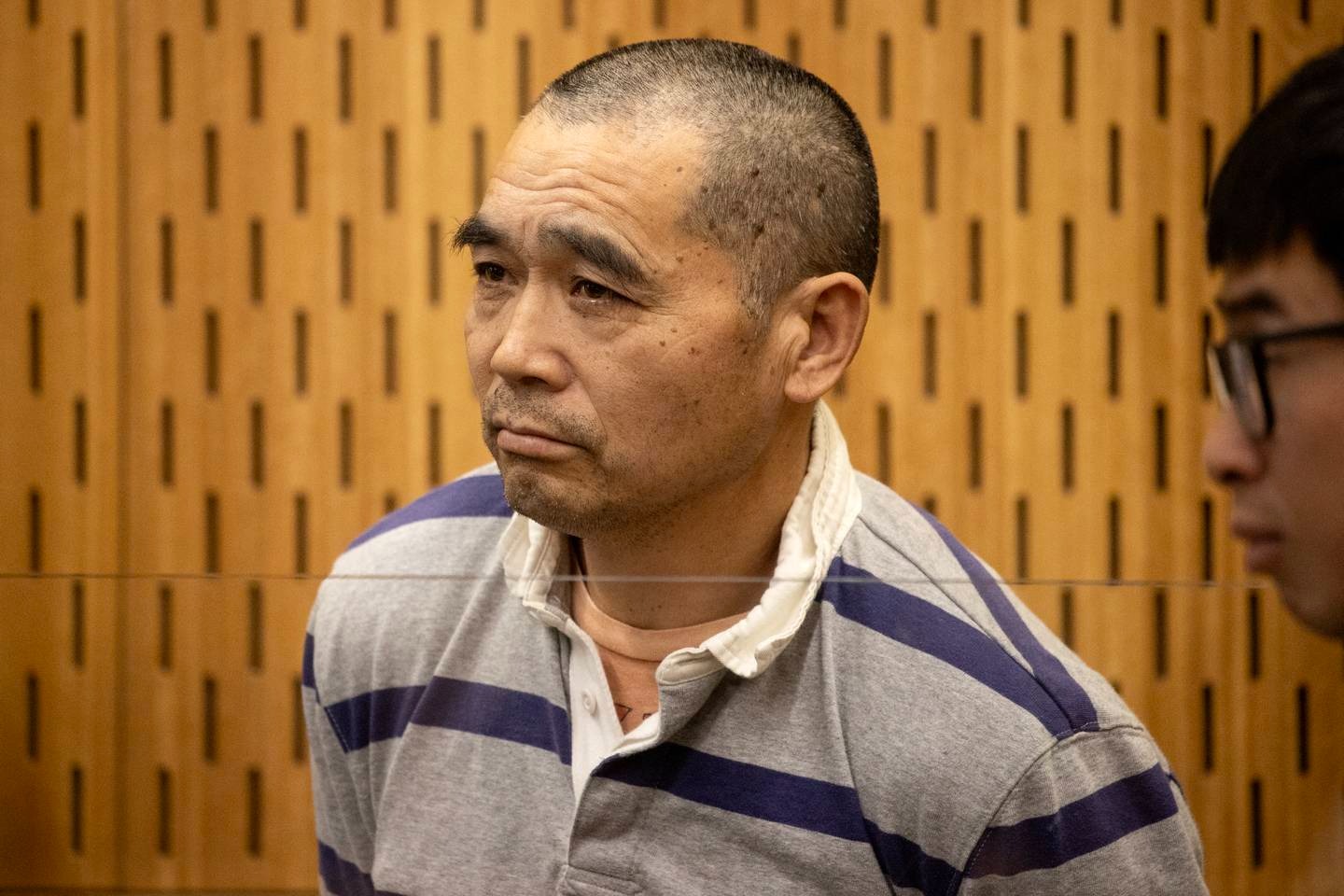 Tingjun Cao is charged with murdering Yanfei Bao on July 19. Photo / George Heard.
