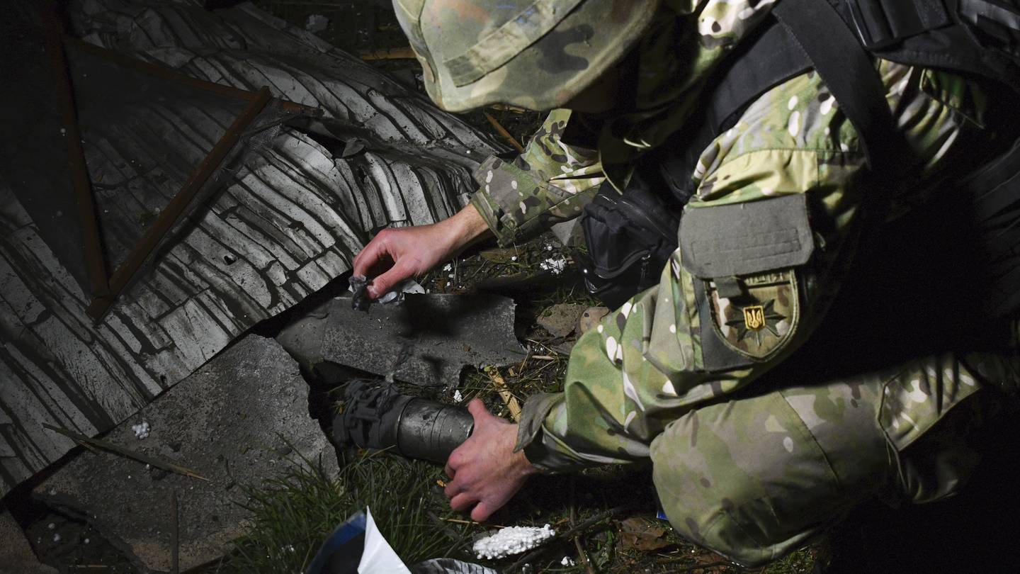 A Ukrainian police investigator at the site of the recent Russian shelling in Kramatorsk, Ukraine Photo / Andriy Andriyenko, AP