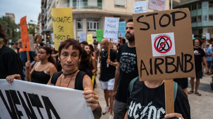 Residents of Alicante have taken to the streets to protest under the slogan 'Alicante is not for sale. Let's put a limit on mass tourism'. Photo / Getty Images