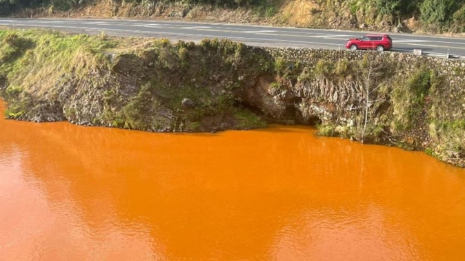 Waikato Regional Council is urging people to treat bright orange discolouration of the Ohinemuri River as contaminated. Photo / Facebook / Waikato Regional Council