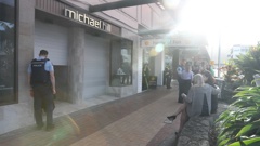 Police guard the scene of a reported aggravated robbery at Michael Hill Jeweller in Whangārei. Photo / Michael Cunningham
