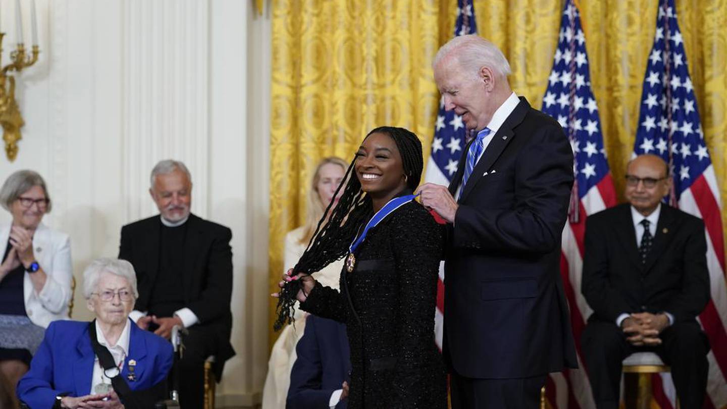 US President Joe Biden awards the nation's highest civilian honour, the Presidential Medal of Freedom, to gymnast Simone Biles. Photo / AP