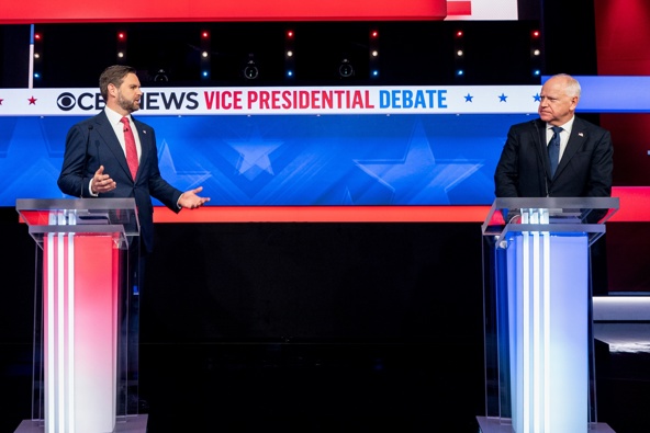 Senator JD Vance, a Republican from Ohio and Republican vice-presidential nominee, left, and Tim Walz, governor of Minnesota and Democratic vice-presidential nominee, during the first vice presidential debate at the CBS Broadcast Center in New York, US. Photographer: Al Drago/Bloomberg via Getty Images