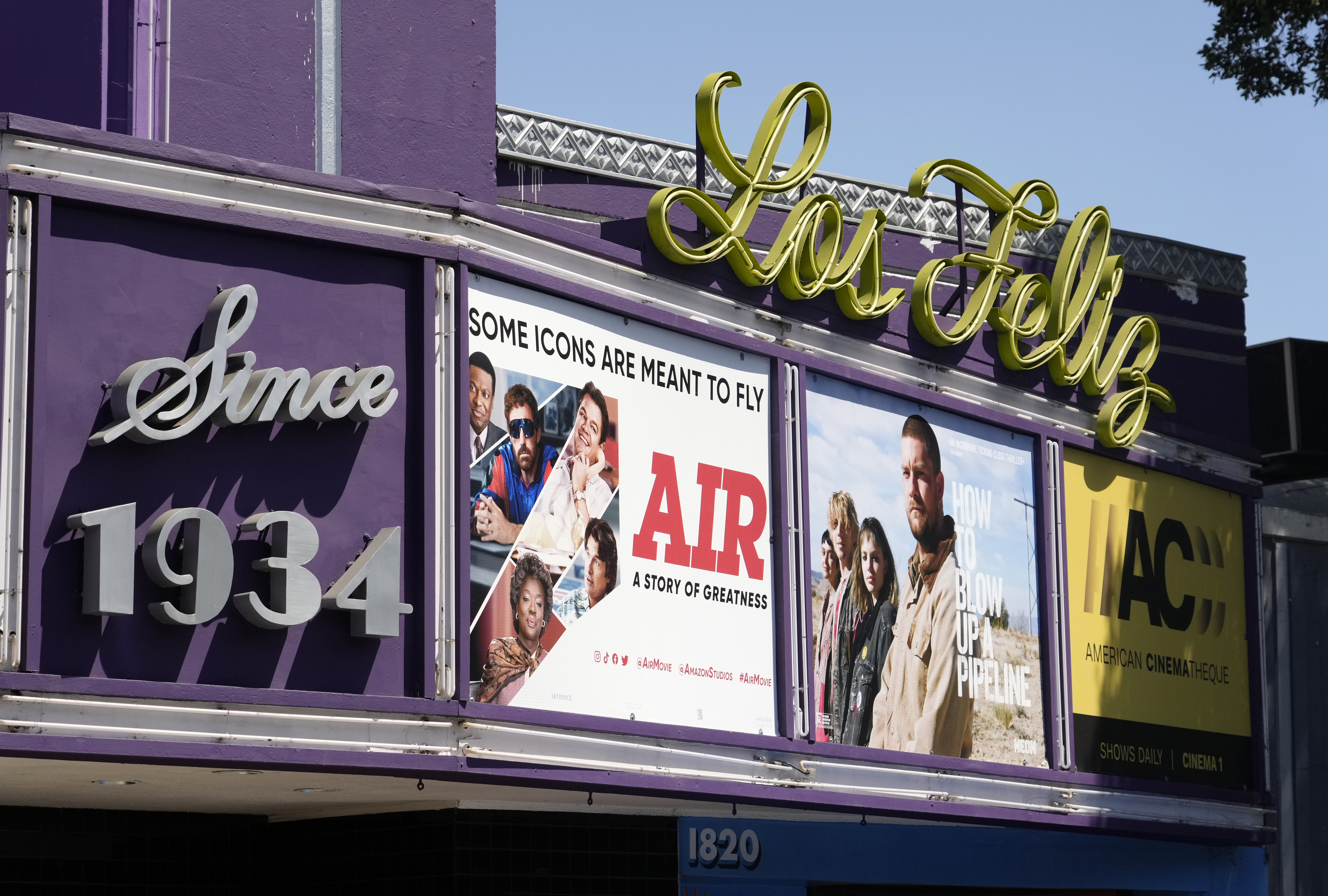 Poster art for the Amazon Studios film "Air" is displayed on the marquee of the Los Feliz Theater, Wednesday, April 19, 2023, in Los Angeles. Amazon Studios plans to release 12 to 15 movies theatrically every year, and Apple is set to spend $1 billion a year on movies that will land in cinemas before streaming. Photo / AP