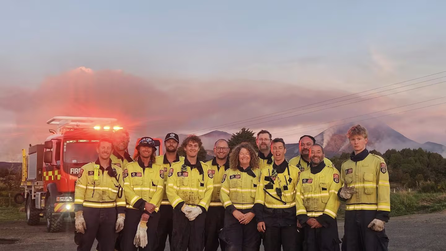 The National Park Volunteer Fire Brigade pictured after a long day helping to bring the Tongariro blaze under control. Photo / Fire and Emergency New Zealand