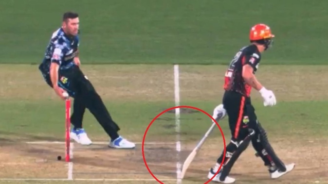 Jamie Overton knocks the bails off before giving Finn Allen a warning during a Big Bash match. Photo / X.com