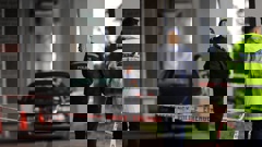 Police have taped a significant area under the Auckland Harbour Bridge next to a Northcote Point property where a woman died on Sunday. Photo / Hayden Woodward