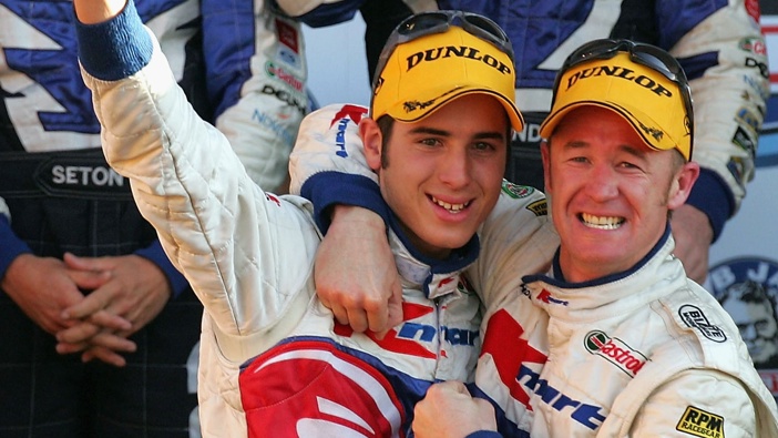 Rick Kelly and Greg Murphy of the Kmart Racing Team celebrate after winning the Bathurst 1000 which is round ten of the 2004 V8 Supercar Championship Series at Mount Panorama on October 10, 2004 in Bathurst, Australia. (Photo by Robert Cianflone/Getty Images)