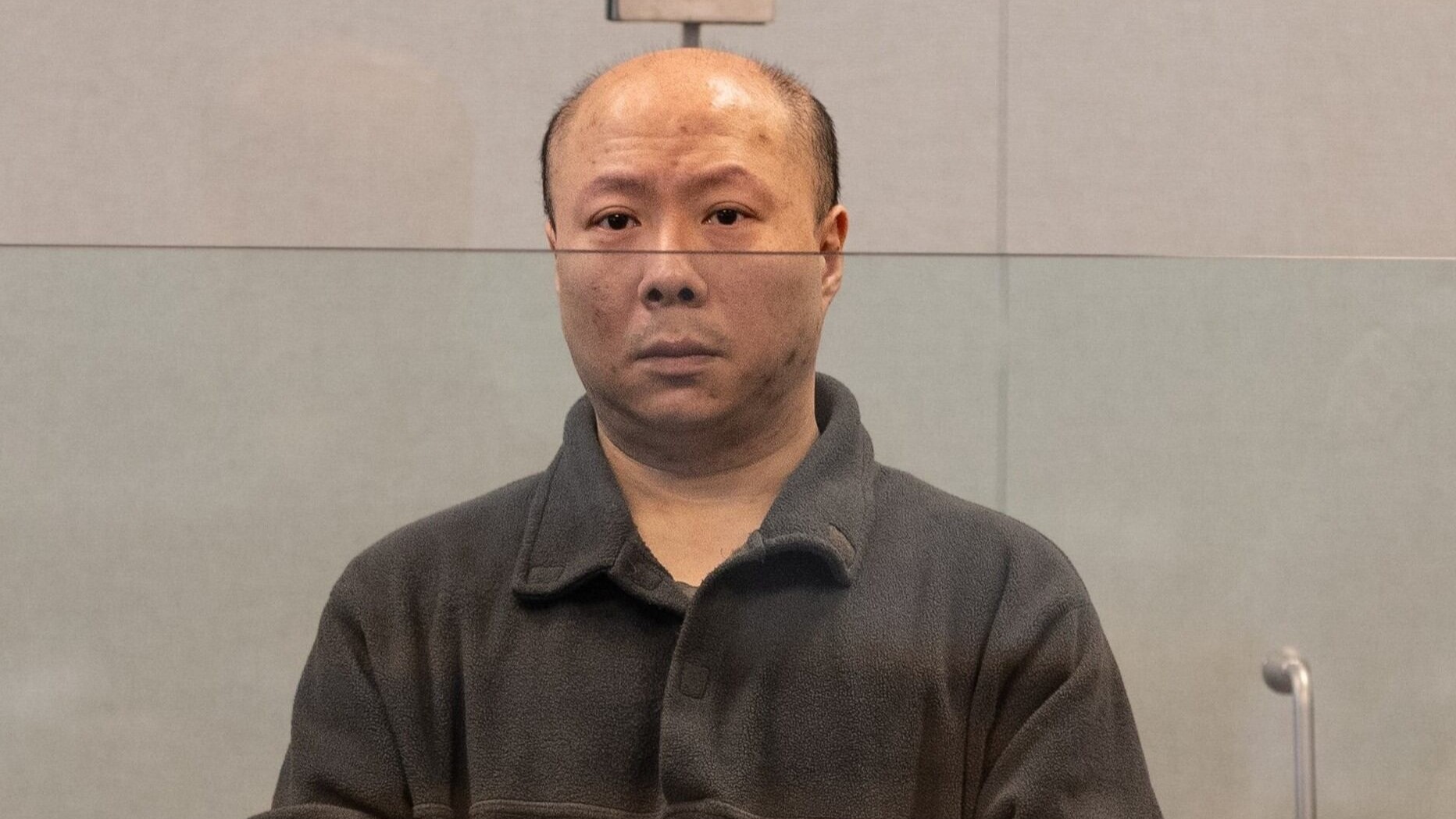 Shu Man Poon appears in the High Court at Auckland, where he pleaded guilty to the murders of Ellerslie couple Fuk-Fu Joseph Kwok and Mei Han Chong on the same morning his trial as set to begin. Photo / Michael Craig