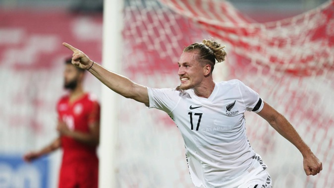 Niko Kirwan celebrates scoring the late winner against Bahrain. Isa Ebrahim / Photsport