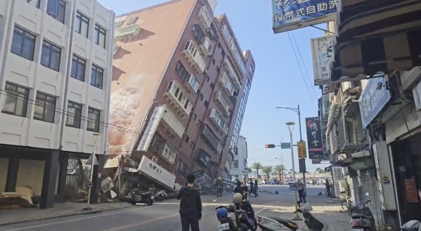 In this image taken from a video footage run by TVBS, a partially collapsed building is seen in Hualien, eastern Taiwan, April 3, 2024. (TVBS via AP)