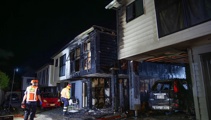 'Get out of the house': Residents' desperate plea as townhouses went up in flames