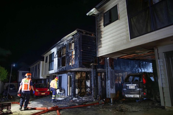 Fire crews at the blaze on Walmsley Rd, Favona. (Photo / Hayden Woodward)