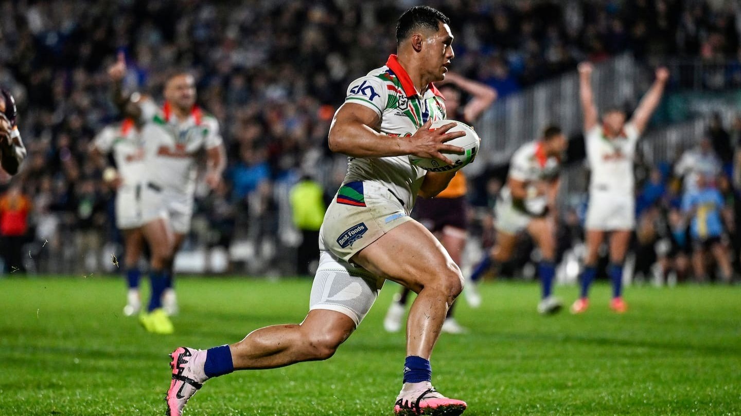 Roger Tuivasa-Sheck runs in for a try against the Broncos. Photo / Photosport