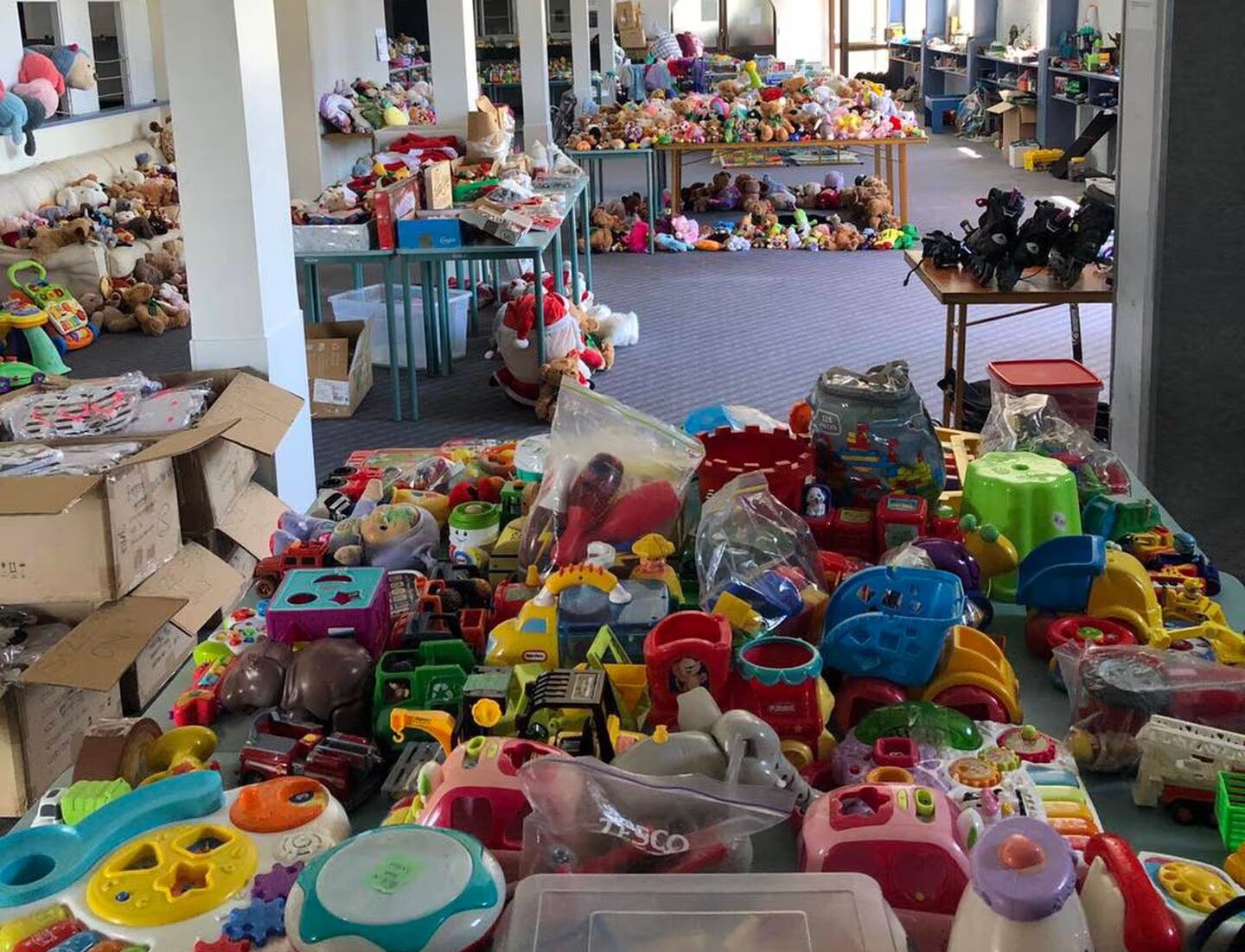 More than 500 people cleared out the mountains of donations in just 35 minutes at the Helping Families event.