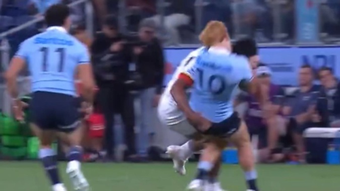 Samipeni Finau smashes Tane Edmed. Photo / Sky Sport