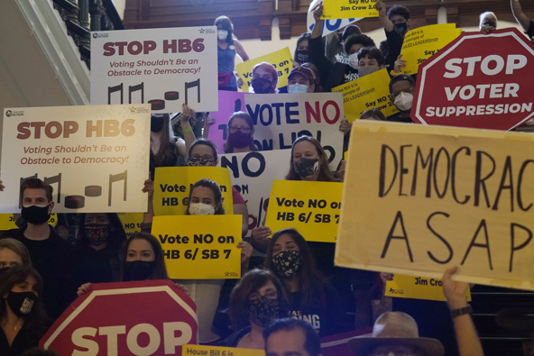 Protestors opposing Texas' new voter legislation outside the House Chamber at the Texas Capitol in Austin. Photo / AP