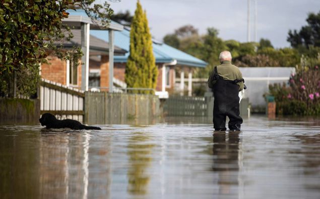 Along with warmer temperatures, winter also brought a series of major storms and floods: notably a mid-July deluge that forced the evacuation of half of Westport. (Photo / George Heard)