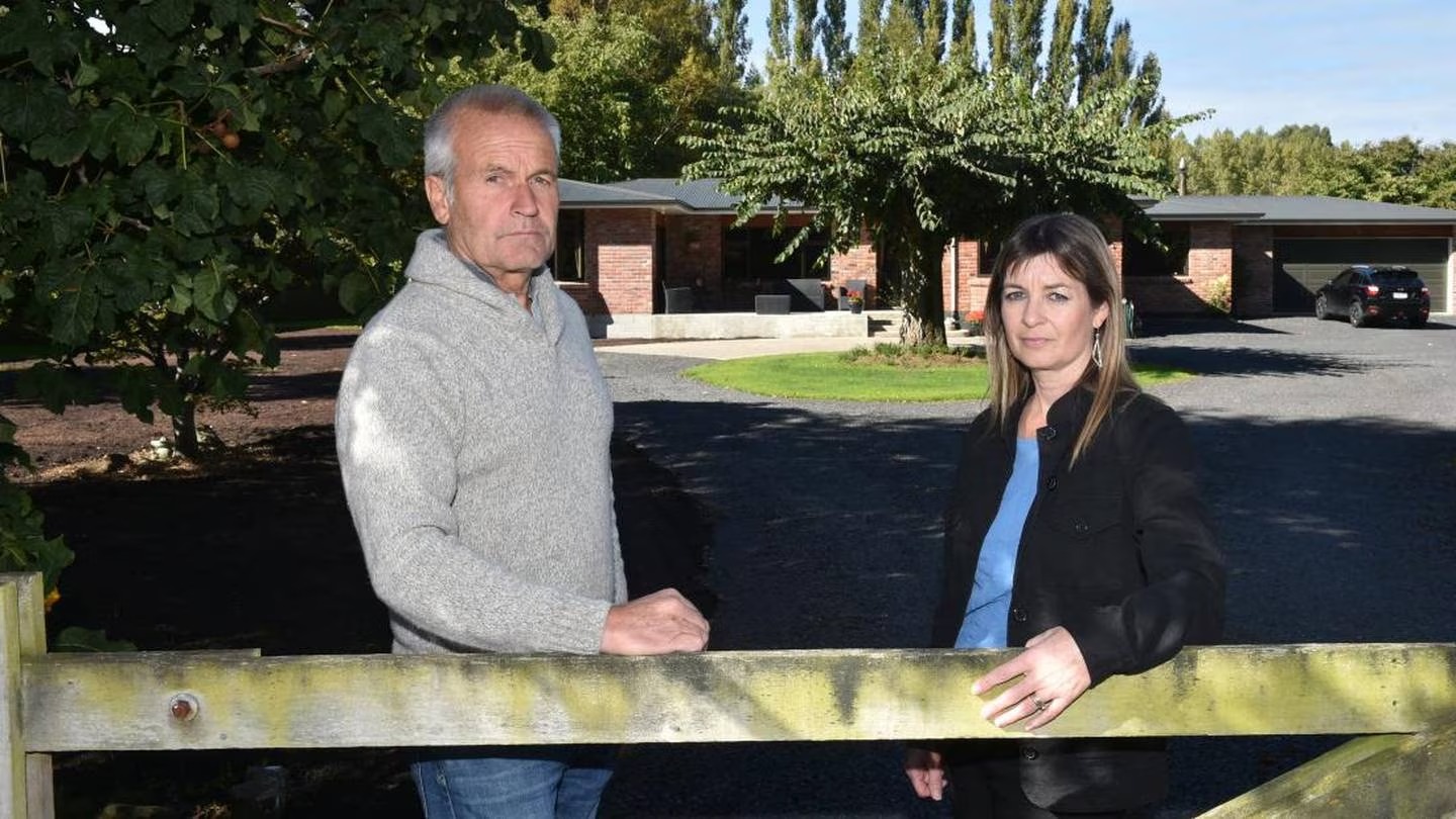 Mosgiel Taieri Community Board chairman Andrew Simms and Gordon Rd Spillway Residents Group co-ordinator Julie Struthers are concerned about potential 'red-zoning' of properties owned by 41 residents. Photo / Gregor Richardson