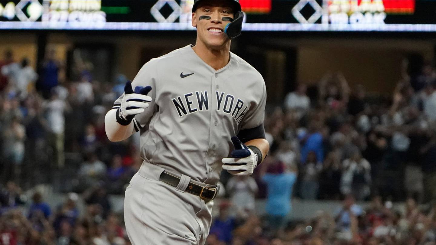 Aaron Judge smiles as he rounds the bases after hitting home run number 62. Photo / AP