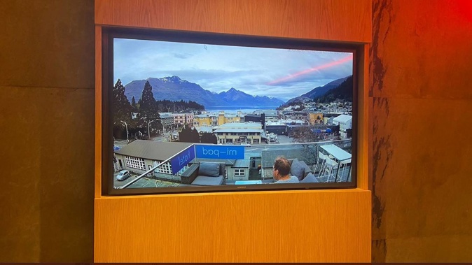 Room with a view: Genius or cheeky, one budget Queenstown hotel has come up with a way to make lake views more affordable. Photo / Miriam Moore, Twitter