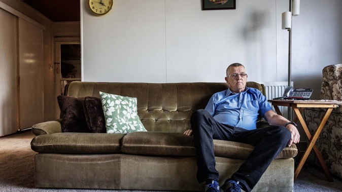 Te Awamutu man Mike Lewis sits in what was his mother's unit in his home. Photo / Mike Scott