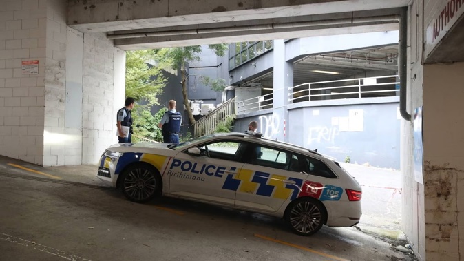 Police at the scene of the Grafton car park homicide at the commercial building on City Road. Photo / Jason Oxenham