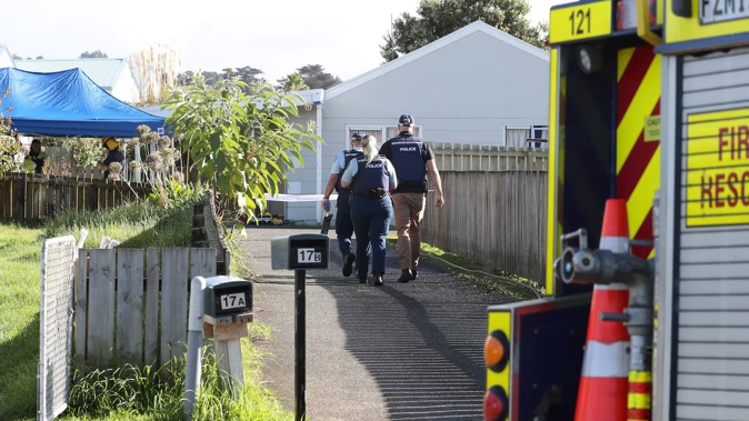 Police at the Thomas St address where John Reuben was killed in a house fire. Photo / NZME