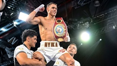David Nyika is lifted on to his team members' shoulders as he celebrates his victory over Tommy Karpency. Photo / Photosport