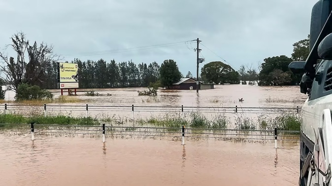 A flooded area near the NSW town of Taree. Torrential rain has lashed eastern Australia, triggering heavy flooding. Photo / New South Wales Police via AFP
