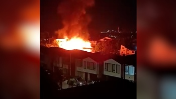 'It just blew': Person suffers dog bite as fire takes hold of home during police operation