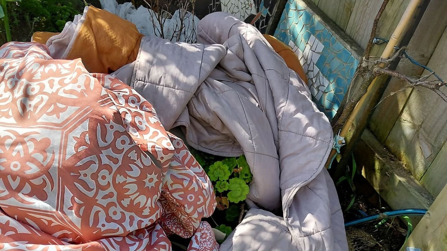 'Helpless' neighbours of Kāinga Ora tenant say rubbish, household items regularly thrown over fence