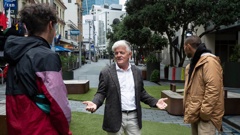 Auckland mayoral candidate Leo Molloy talks with some rough sleepers in the CBD. Photo / Brett Phibbs