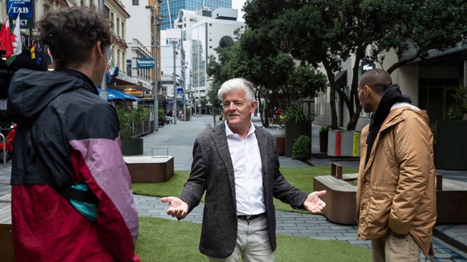 Auckland mayoral candidate Leo Molloy talks with some rough sleepers in the CBD. Photo / Brett Phibbs