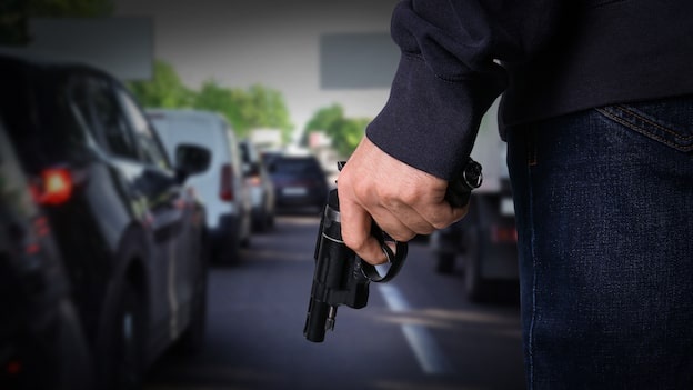 'Victims shaken': Two men charged after motorists followed, threatened with firearm