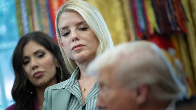 Homeland Security Secretary Kristi Noem, Attorney-General Pam Bondi and US President Donald Trump in the Oval Office last week. Photo / Tom Brenner, for The Washington Post