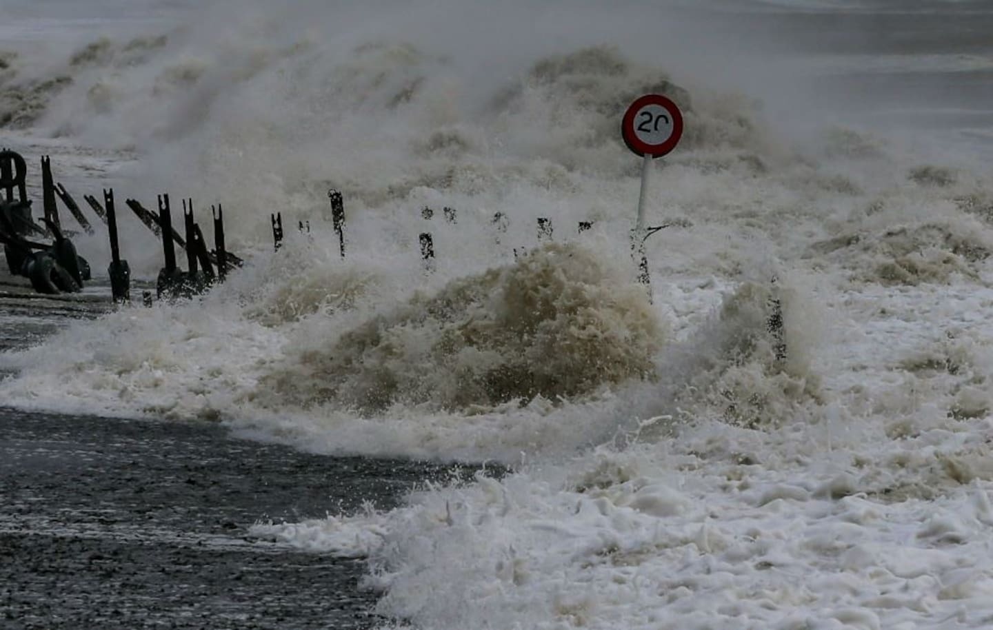 A speed sign has washed up at Te Awanga Beach. Photo / Paul Taylor