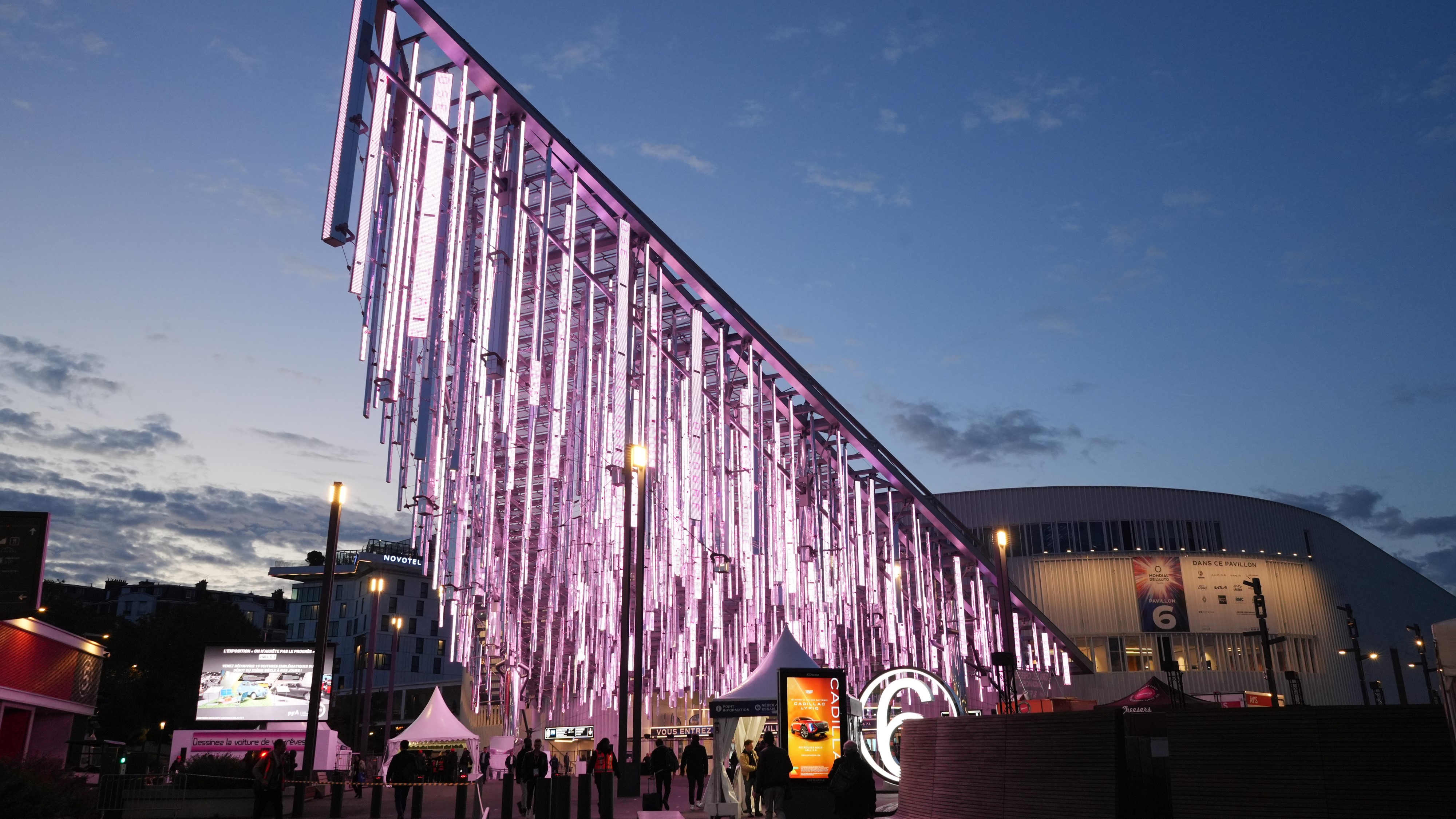 Visitors arrive for the media day at the Paris Motor Show in Paris, France, on Monday, Oct. 14, 2024. Photo / Nathan Laine/Bloomberg via Getty Images