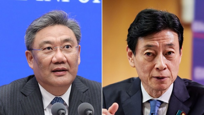 China's commerce minster, Wang Wentao, left, met Yasutoshi Nishimura, Japan's trade minister, in Detroit last week. Getty Images