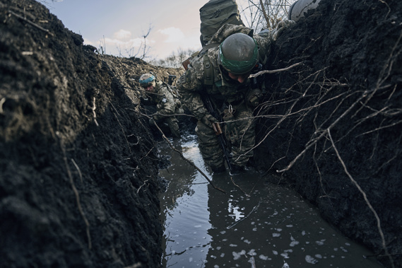 Ukrainian soldiers in a trench under Russian shelling on the frontline close to Bakhmut, Donetsk region, Ukraine. Photo / AP