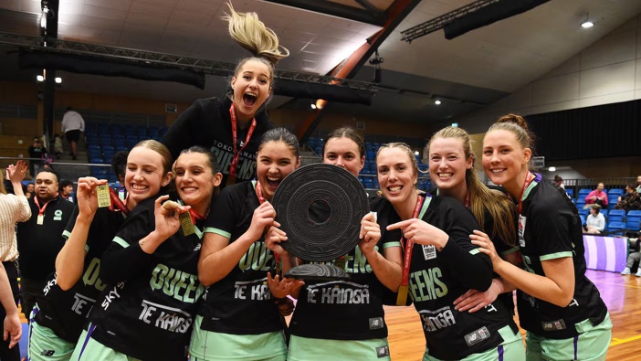 Tokomanawa Queens players celebrate winning the inaugural Tauihi Basketball Aotearoa title. Photo / Photosport