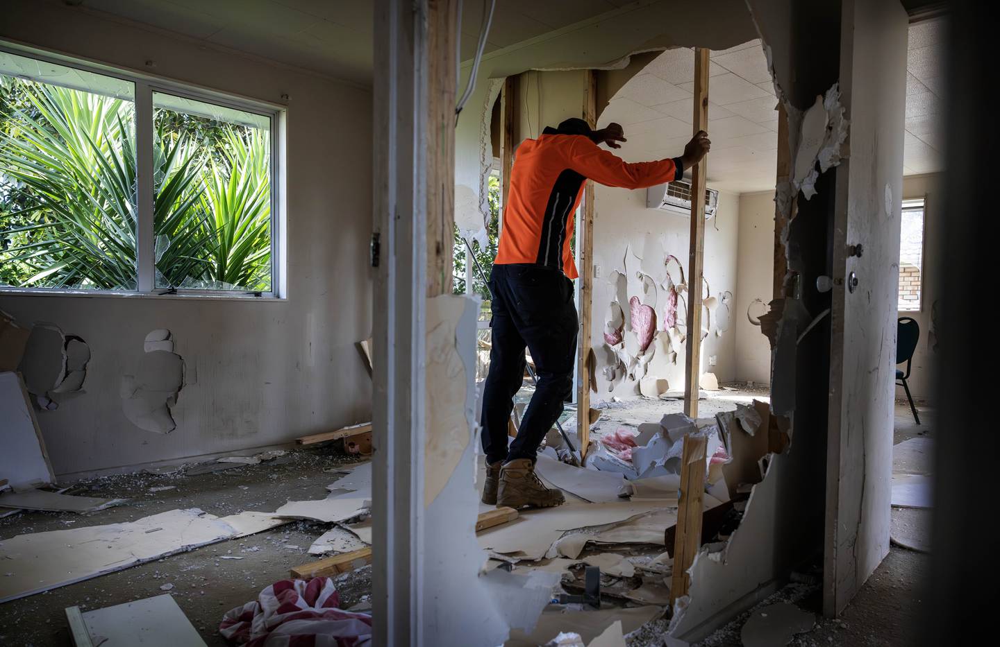 More than 22 people turned up at Sandhu's rental property and destroyed each and every wall and window. Photo / Mike Scott